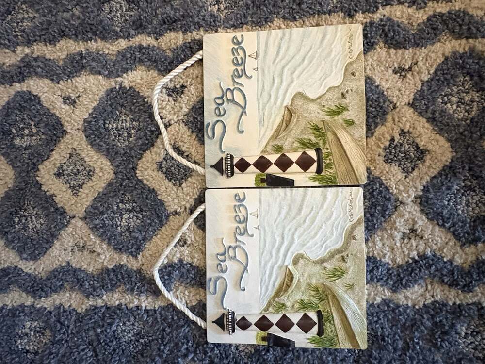 Set of 2 Kate McRostie Sea Breeze Cape Lookout Lighthouse Nautical Wall Plaques